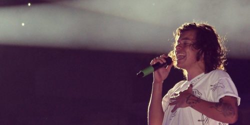 Harry Styles performs at a concert.