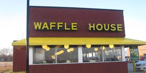 The outside of a Waffle House location.