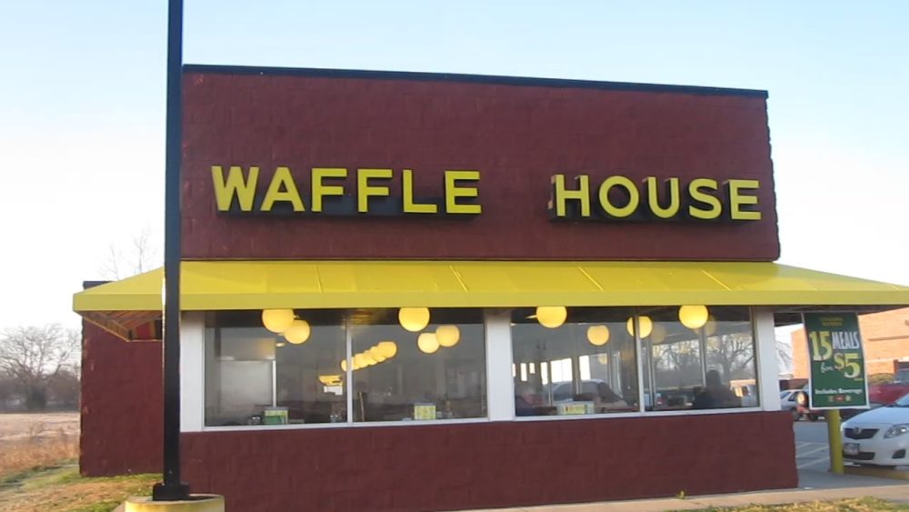 The outside of a Waffle House location.