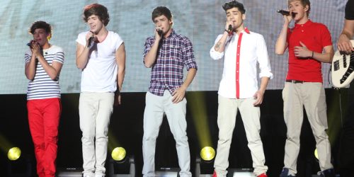 One Direction performs live.