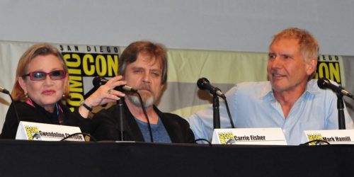 Carrie Fisher, Mark Hamill, and Harrison Ford at a Comic-Con Panel.