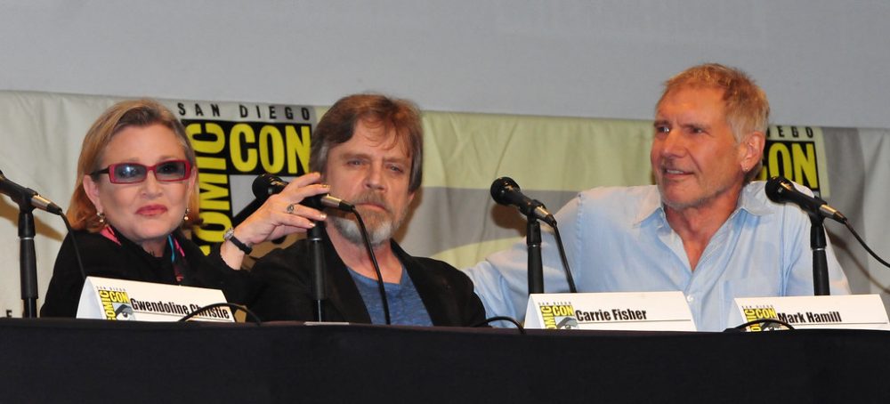 Carrie Fisher, Mark Hamill, and Harrison Ford at a Comic-Con Panel.