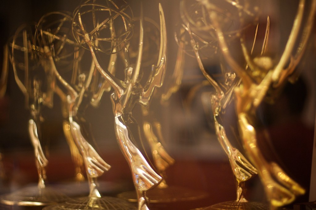 A series of Emmys posed for a photo.